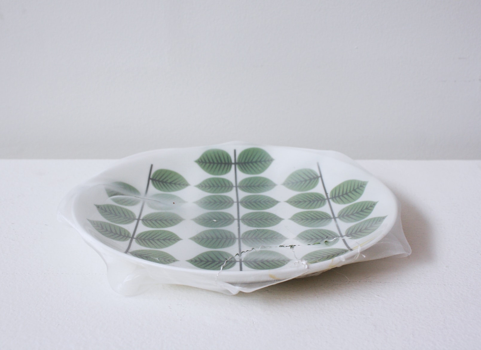 ‘Renovated leaves dish’, 2011, ceramic plate, Italian synthetic cloth, Japanese silk thread, 3H x 21H cm