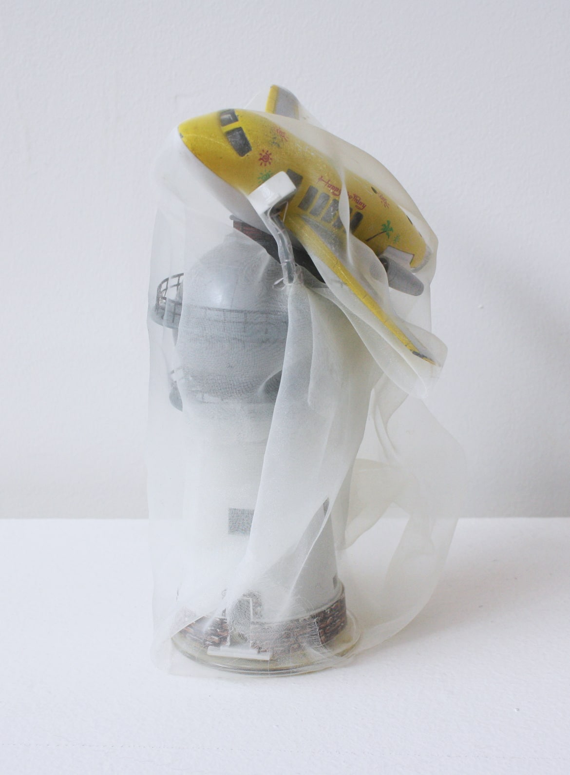 ‘The accident 2’, 2014, model lighthouse, model aeroplane, Italian synthetic cloth, Japanese silk thread, 21H x 11D cm