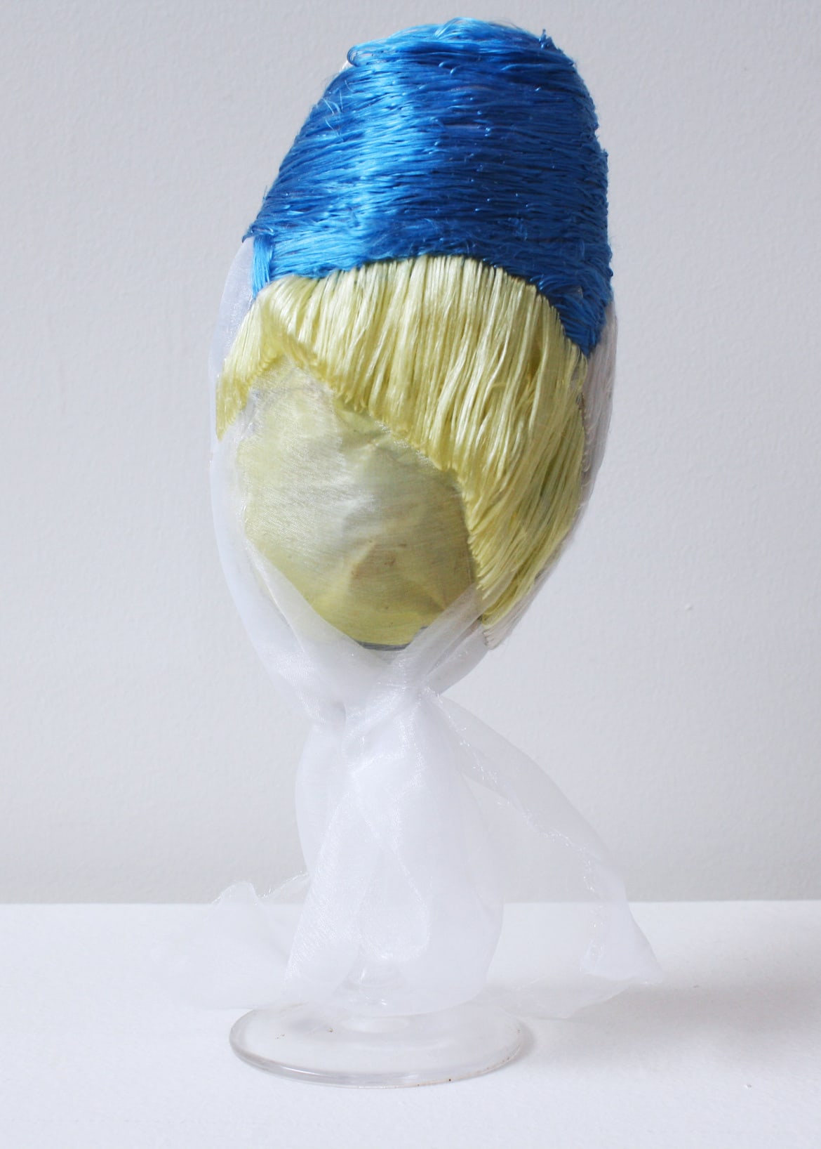 ‘Glass blue/yellow’, 2008, wine glass, Italian synthetic cloth, Japanese silk thread, 25H x 8D cm