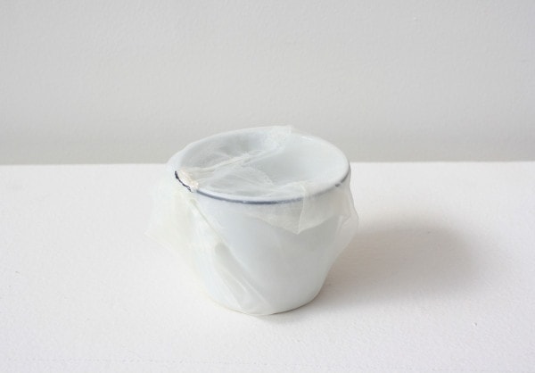 ‘Renovated coffee cup’, 2013, ceramic cup, Italian synthetic cloth, Japanese silk thread, 7H x 8D cm