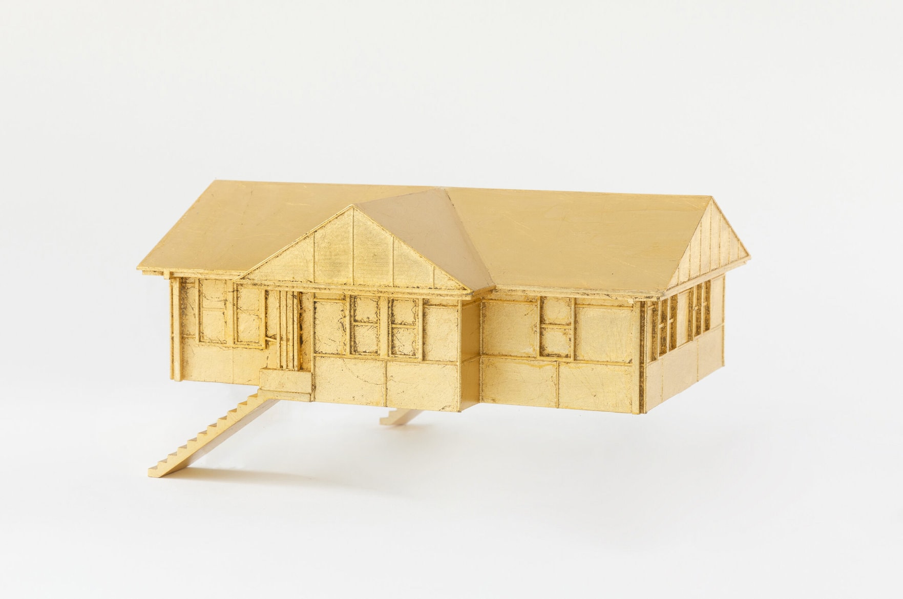 ‘Golden House Series: House 4’, 2022-23, stereolithographic model and gold leaf, 13 x 26 x 33 cm (size varies), edition of 2